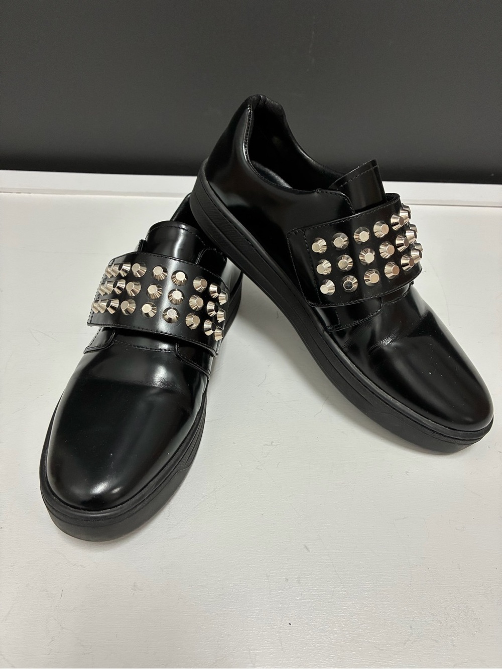 Authentic Prada Studded Black Leather Slip-On Sneakers
